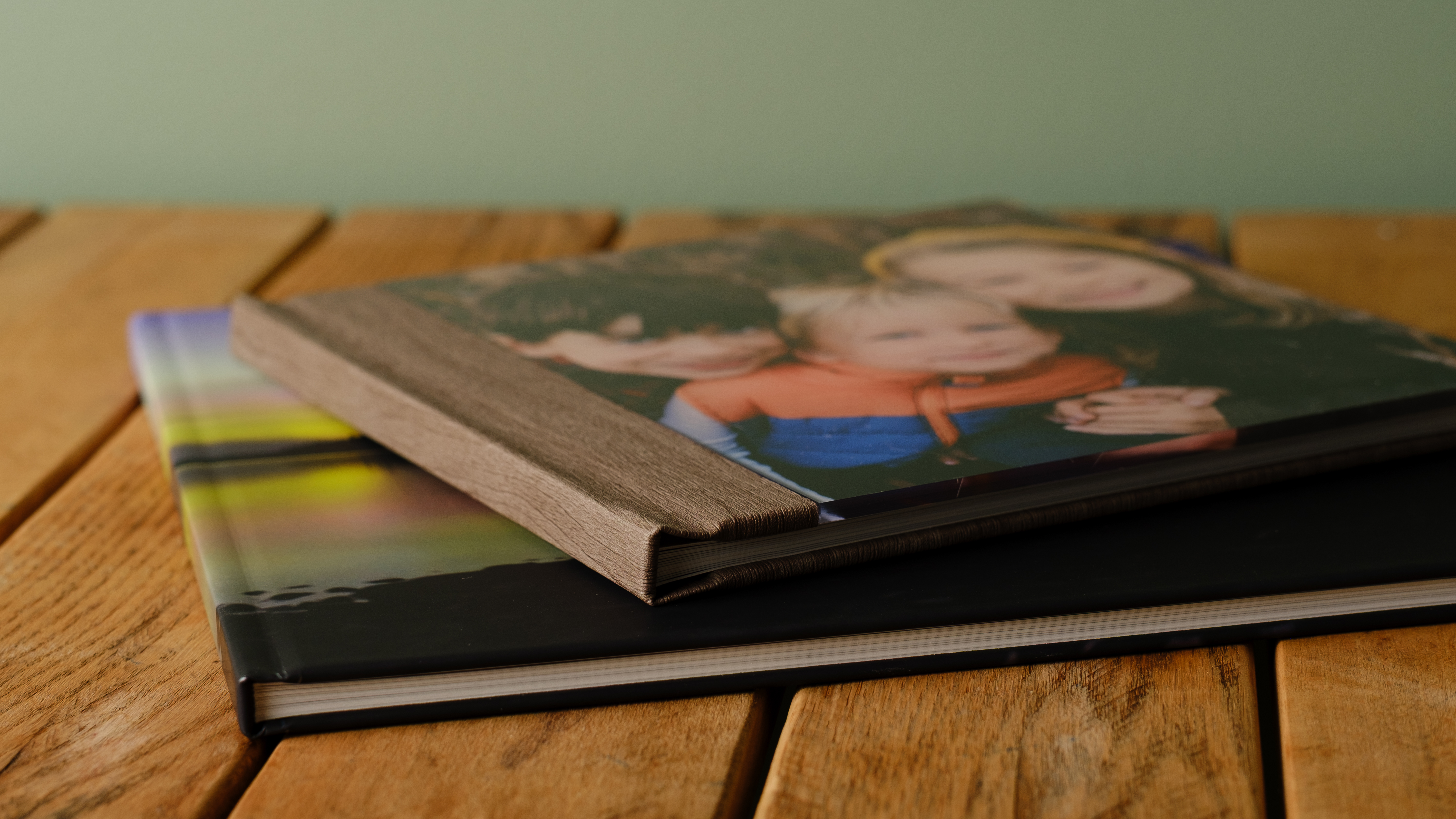 Photo books from Saal on a desktop