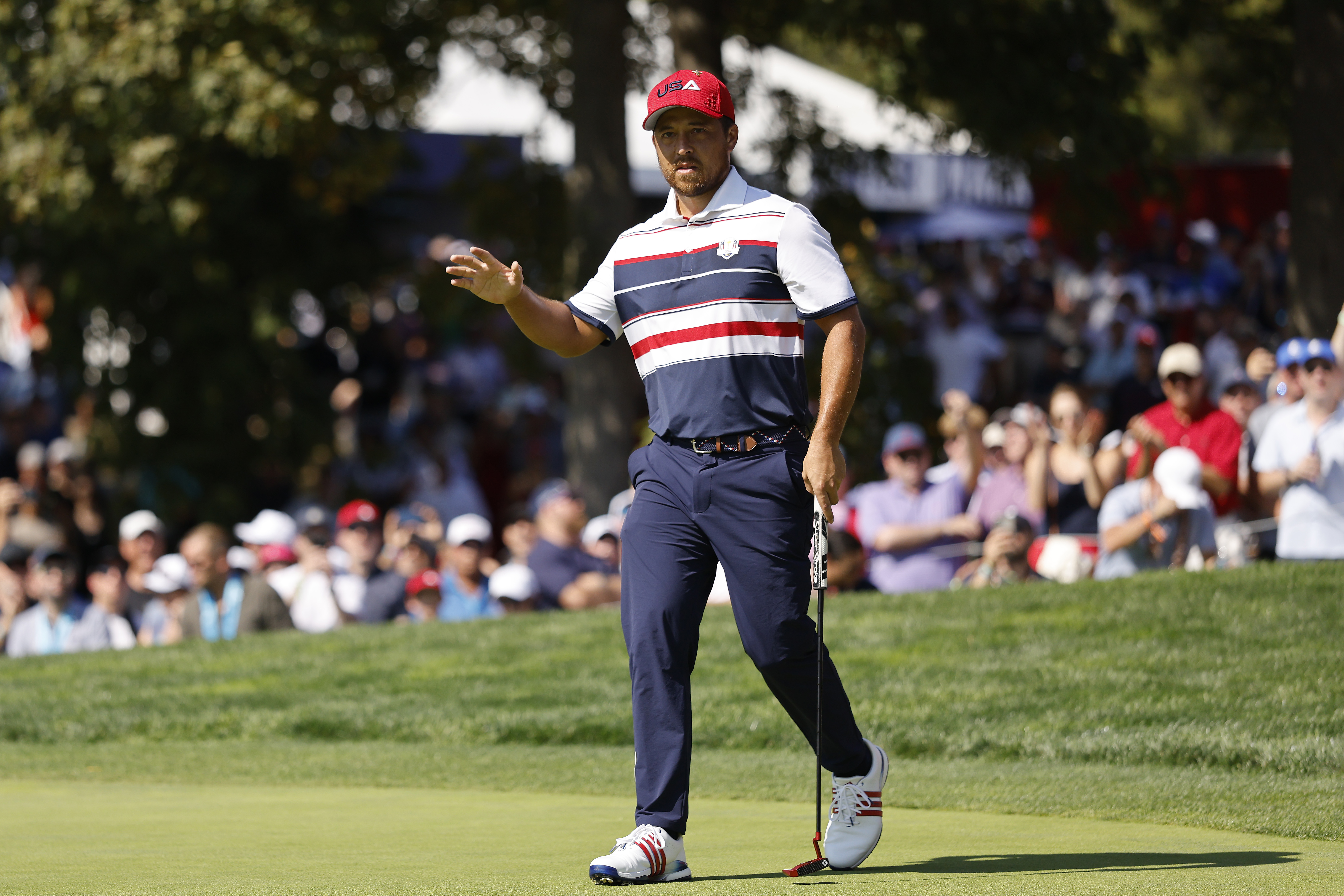 Xander Schauffele acknowledges the crowd at the 2025 Ryder Cup