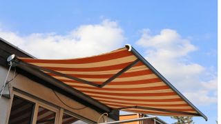 Striped awning over patio
