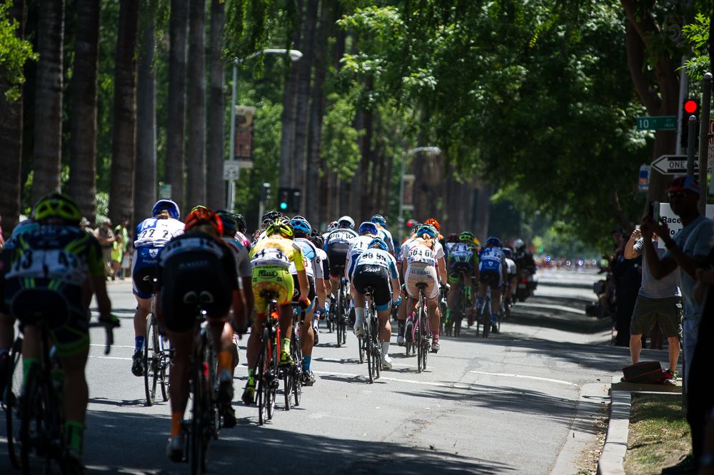 The women get strung out along the back side of the course