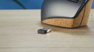 A Lenovo Go Wireless Vertical mouse