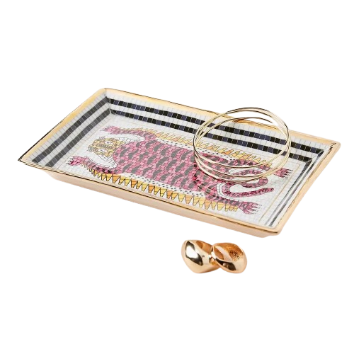 A stoneware trinket dish with a mosaic tiger motif