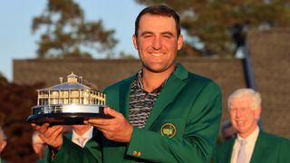 Scottie Scheffler poses with the Masters trophy during the Green Jacket Ceremony after winning the Masters at Augusta National Golf Club 