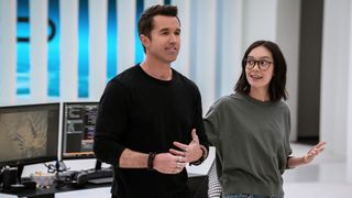 (L to R) Rob McElhenney as Ian Grimm and Charlotte Nicdao as Poppy Li in Mythic Quest