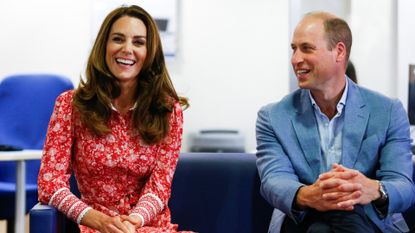 Prince William, Duke of Cambridge and Catherine, Duchess of Cambridge speak to people looking for work at the London Bridge Jobcentre
