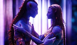 Avatar Jake and Neytyri embrace in the forests of Pandora