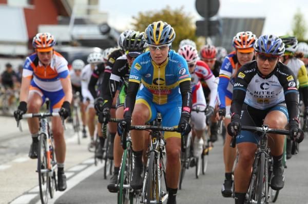 Hitec Products - Mistral Home, Emma Johansson and Sara Mustonen police the front of the bunch with team-mate Christel Ferrier-Bruneau in the lead