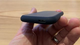 Sandisk Extreme Portable SSD V2 held in a hand
