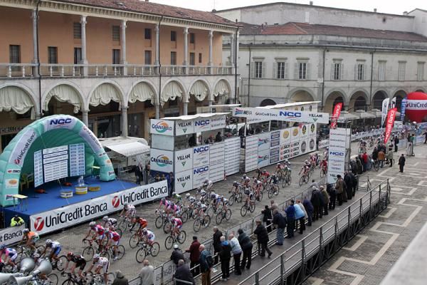 The peloton passes through the finish area earlier in the stage.