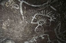 A depiction of a man rubbed into a Mona Island cave wall at least 500 years ago