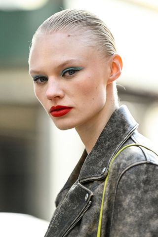 Vilma Sjoberg wearing the teal eyeshadow beauty trend NYFW AW24
