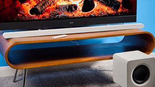 the samsung hw-s801d soundbar and subwoofer in white, an ultra slim soundbar with on-bar buttons, a remote, and separate subwoofer with a black cone