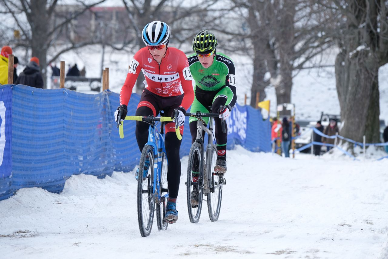 Lance Haidet (Raleigh Clement) leading Gage Hecht on snow covered grass