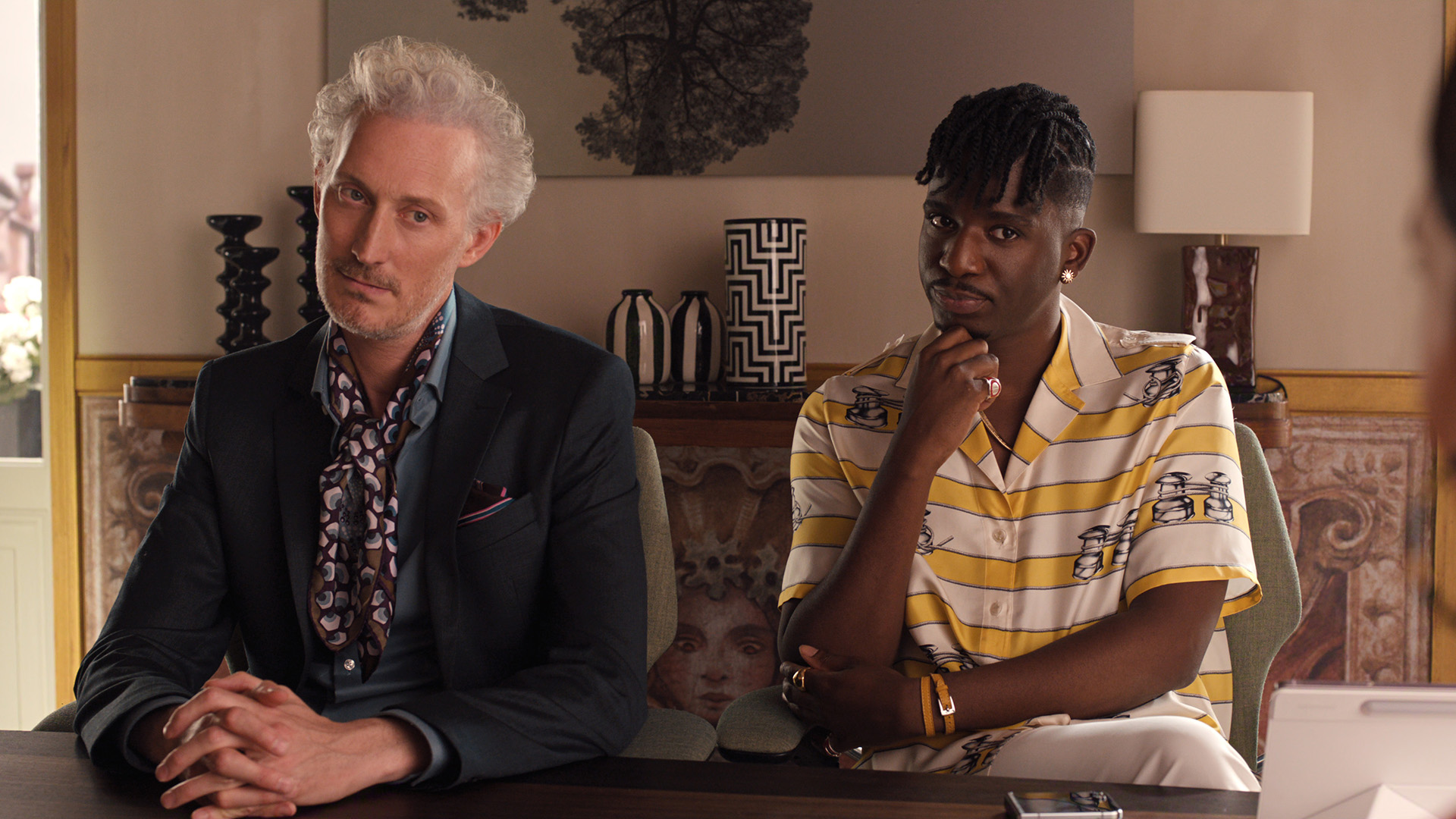 Bruno Gouery as Luc and Samuel Arnold as Julien in Emily in Paris season 5.