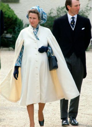 Princess Anne in a white cape coat