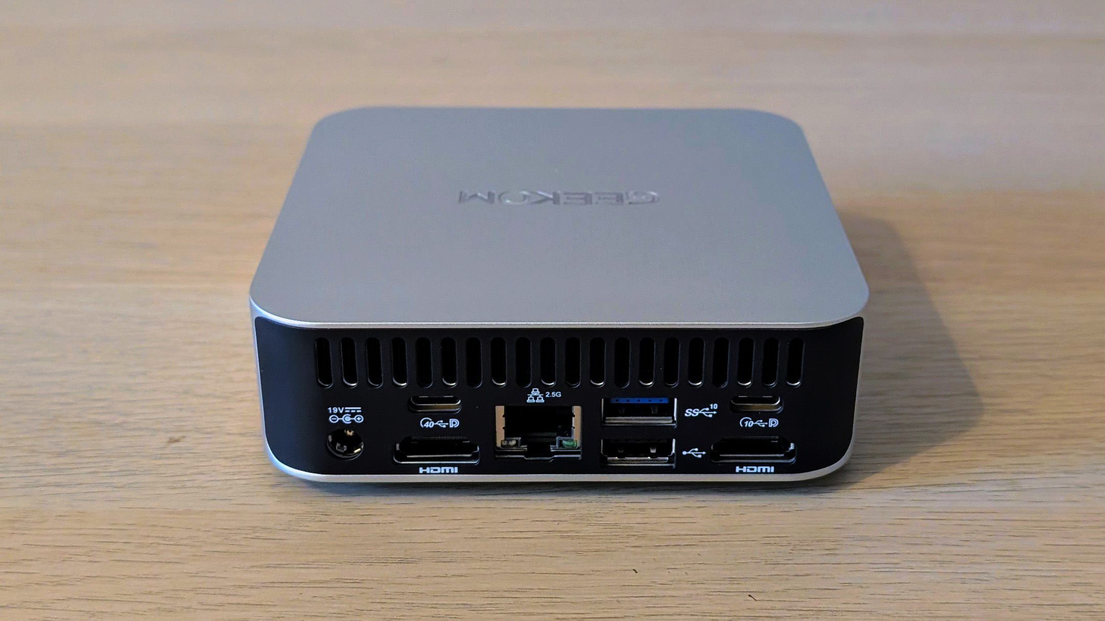 The Geekom A8 AI mini PC on a desk