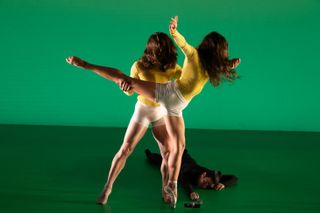 Two woman is dancing on the screen
