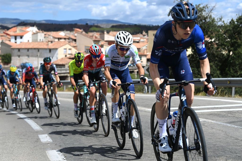 OBSERVATORIO ASTROFSICO DE JAVALAMBRE SPAIN AUGUST 31 Lenny Martinez of France and Team Groupama FDJ White Best Young Rider Jersey compete in the breakaway passing through Valbona Village during the 78th Tour of Spain 2023 Stage 6 a 1831km stage from La Vall dUix to Observatorio Astrofsico de Javalambre 1947m UCIWT on August 31 2023 in Observatorio Astrofsico de Javalambre Spain Photo by Tim de WaeleGetty Images