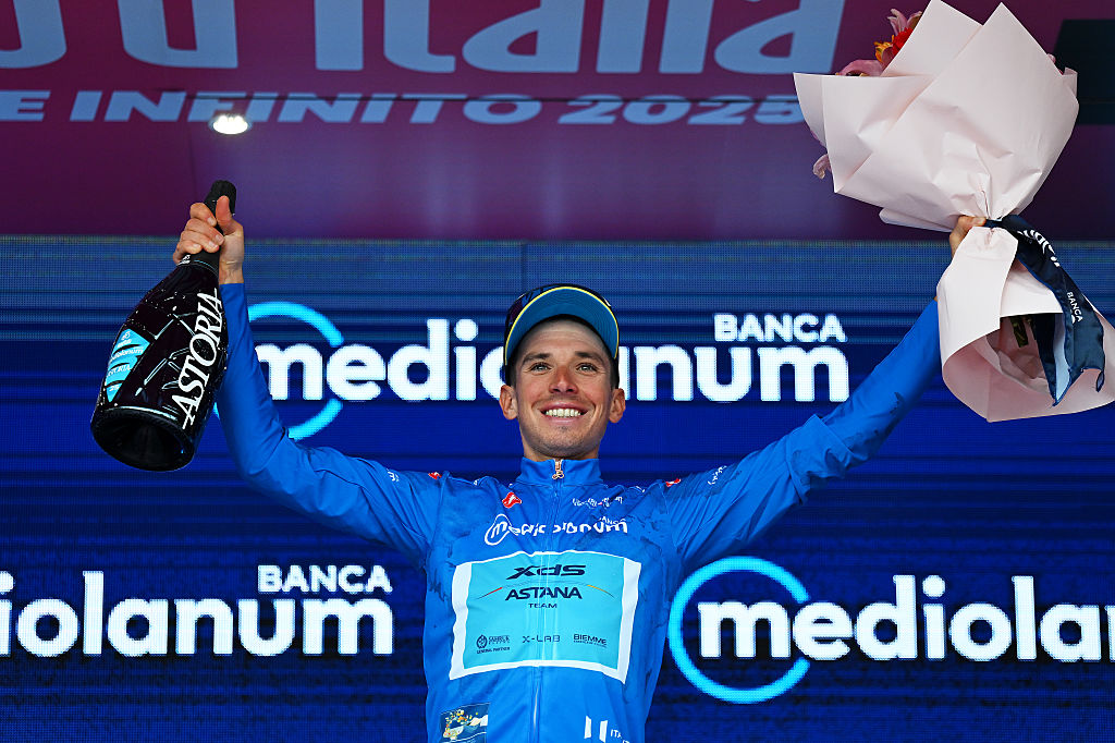 Lorenzo Fortunato of Italy and Team XDS Astana celebrates at podium as Blue Mountain Jerseyw winner during the 108th Giro d&#039;Italia 2025, Stage 3