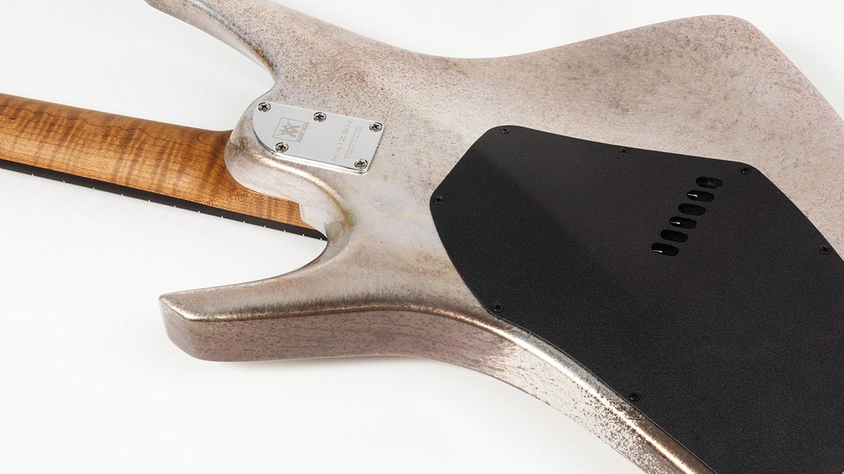 The Ernie Ball Music Man Kaizen Gallium has a custom aged metallic finish, making Tosin Abasi's signature electric guitar look like an alien artefact