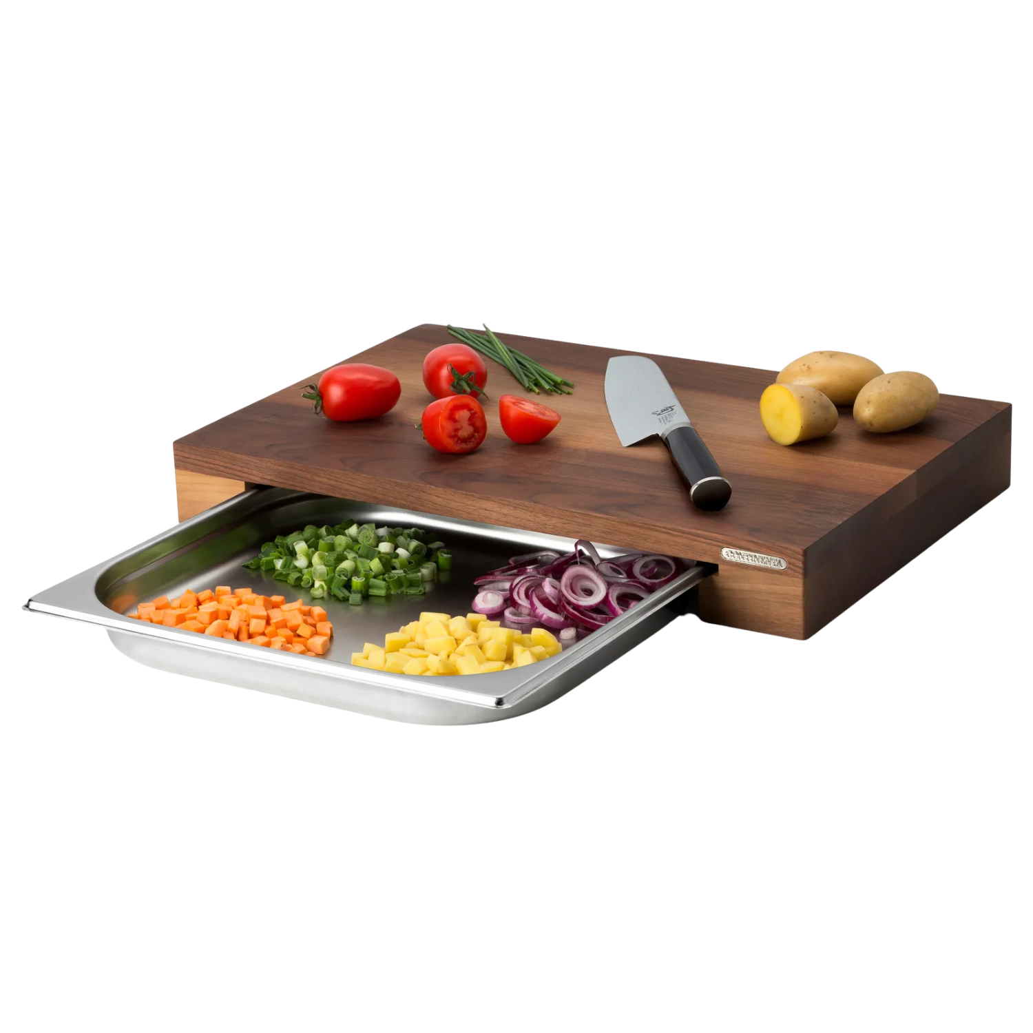 A dark wood cutting board with a metal tray and chopped vegetables
