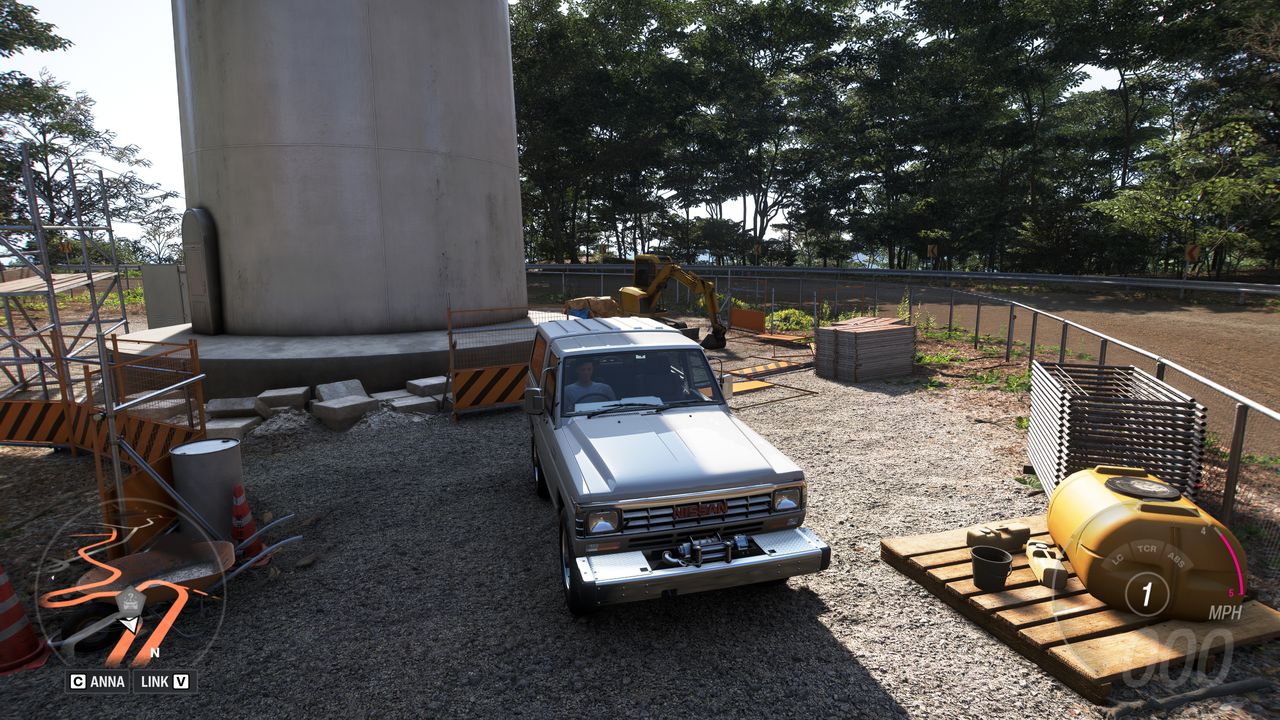 Forza Horizon 6 Treasure Cars: A Nissan Safari parked at the base of a wind turbine.
