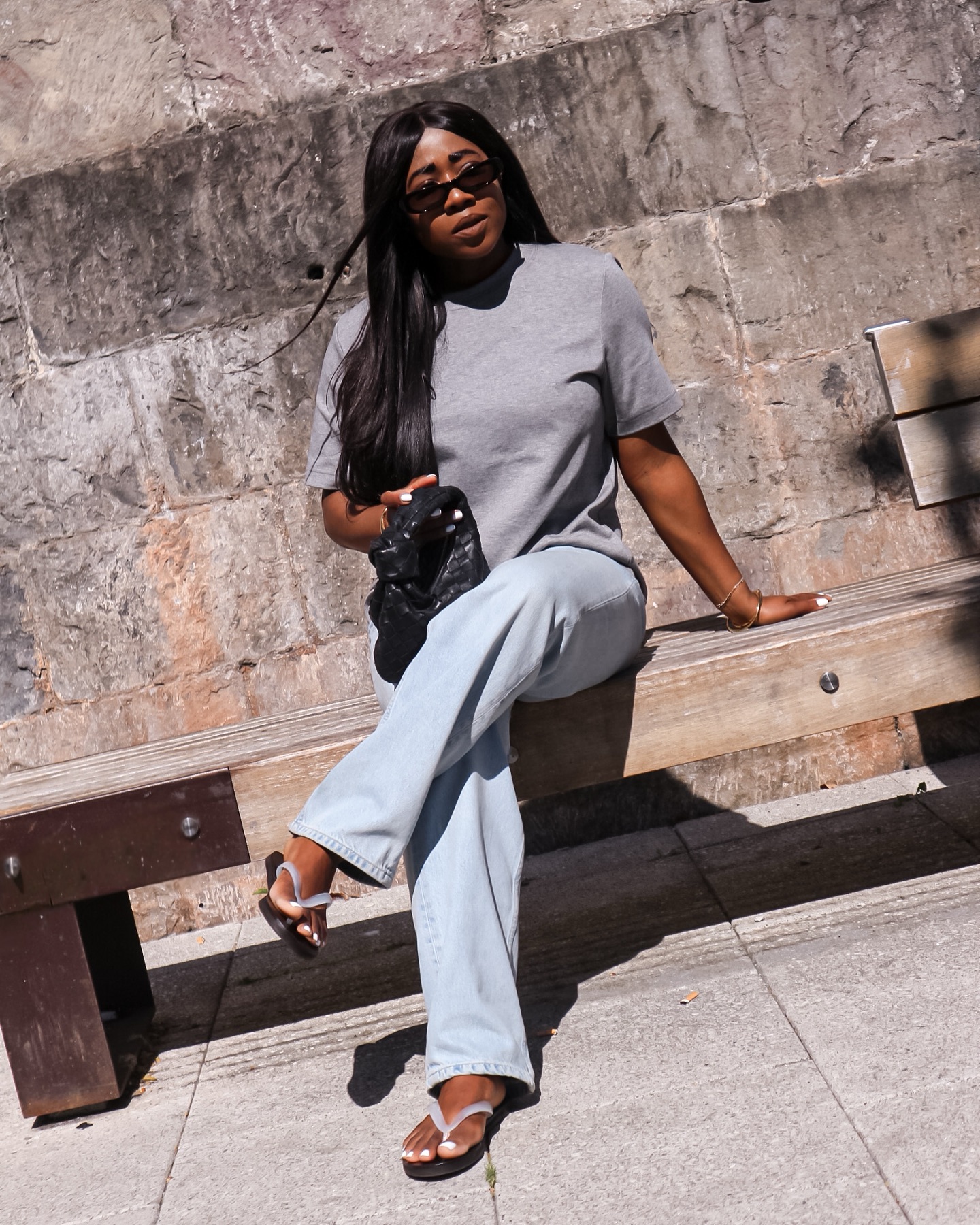 An image of @_loissterling wearing the Ancient Greek Sandal Saionara jelly, one of the 'it' sandals of 2025.