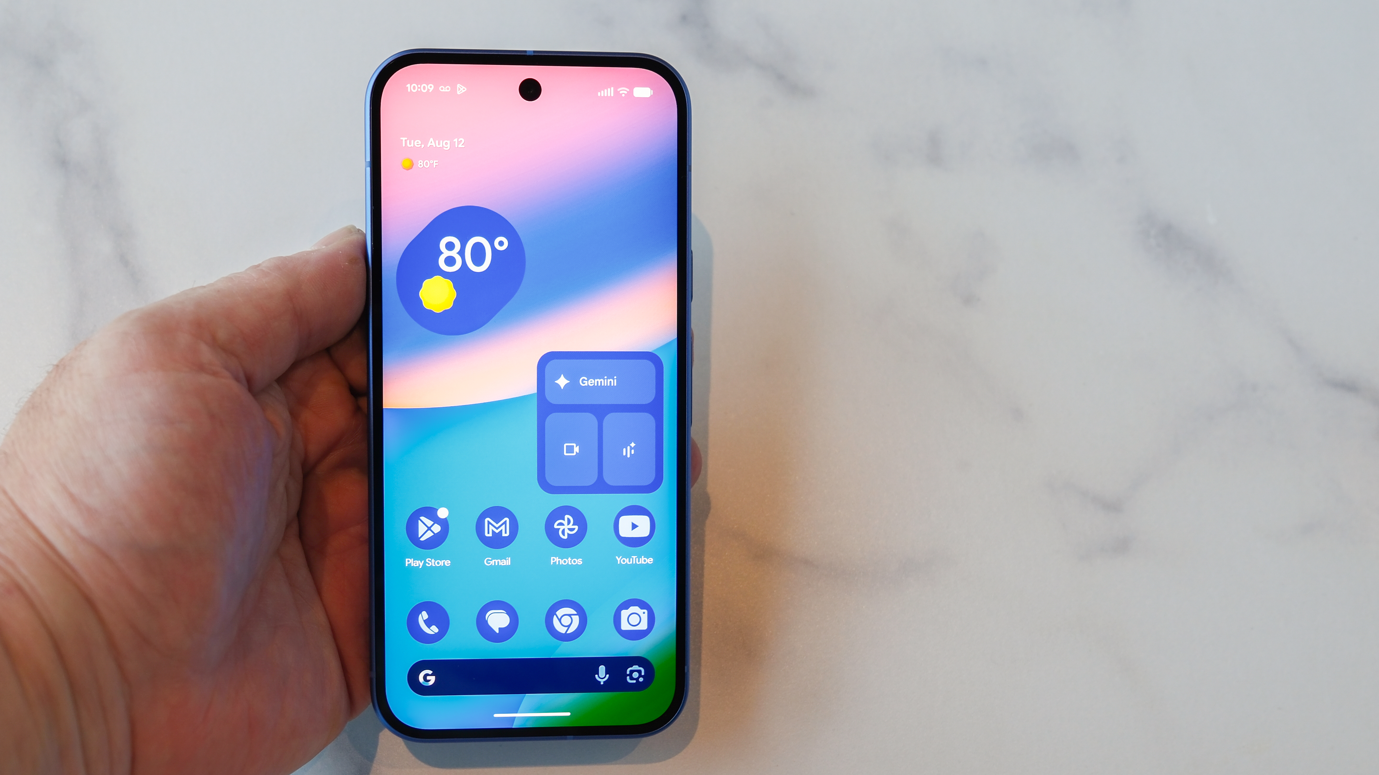 Google Pixel 10 showing home screen and widgets