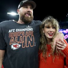 Taylor Swift and Travis Kelce smile together after a Kansas City Chiefs NFL game