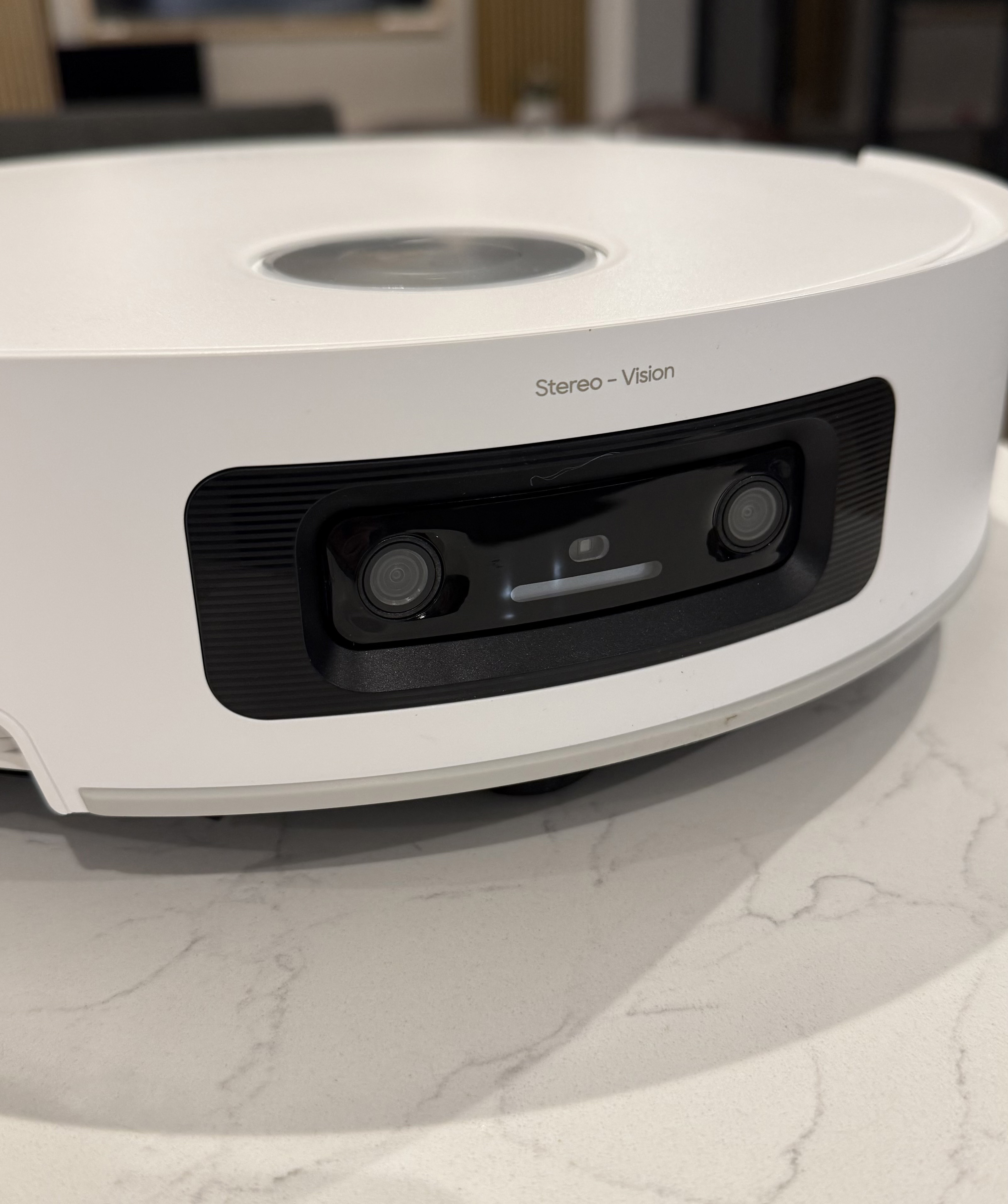 Close-up of the Dreame Aqua10 Ultra Roller&rsquo;s front-facing stereo vision cameras and obstacle detection sensors