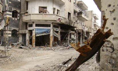 Syrian President Bashar al-Assad has reportedly agreed to pull his troops out of battered rebel strongholds like Homs (pictured) and Idlib.