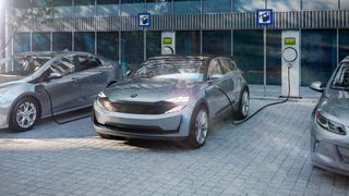 Cars parked at an EV charging station.