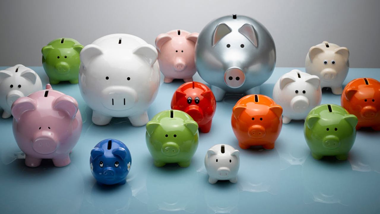 A collection of colorful piggy banks.