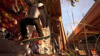 Session: Skate Sim - A skater doing a trick beneath an overpass in a city.