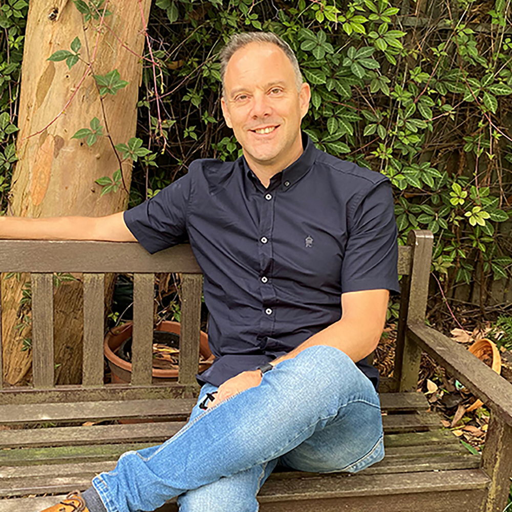 Richard Davonport sitting on a bench