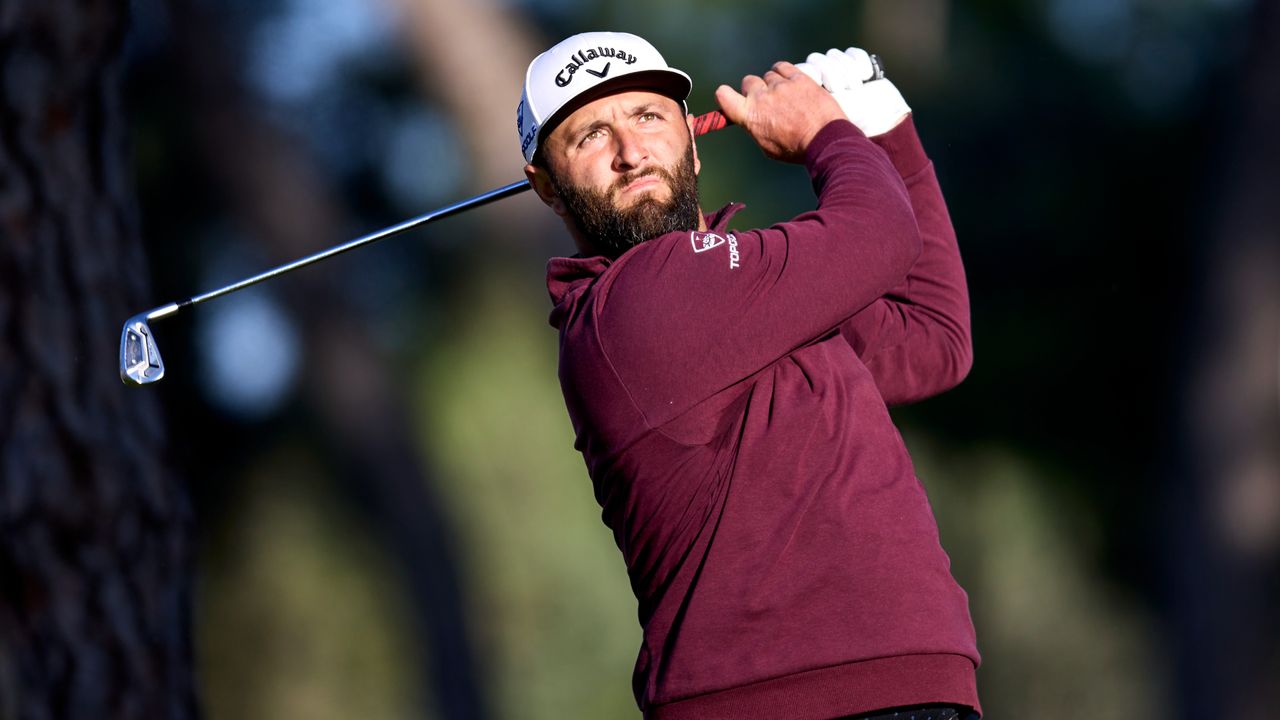 Jon Rahm of Spain plays a tee shot on the 11th hole on Day One of the acciona Open de Espana