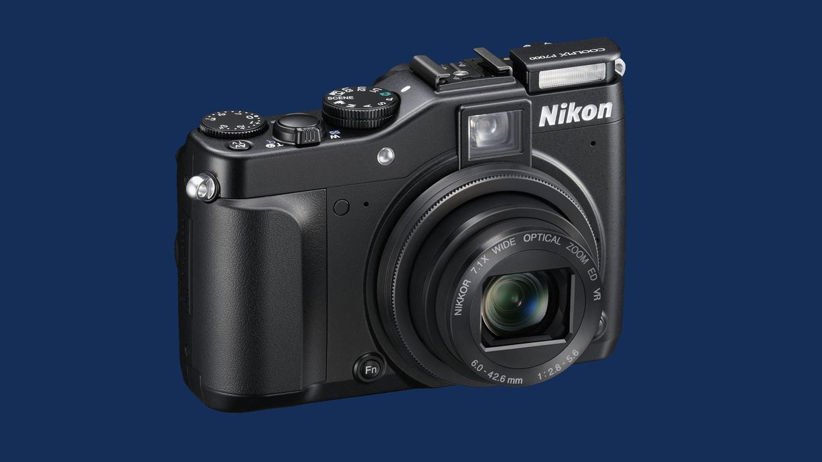 The Nikon Coolpix P7000 on a blue background