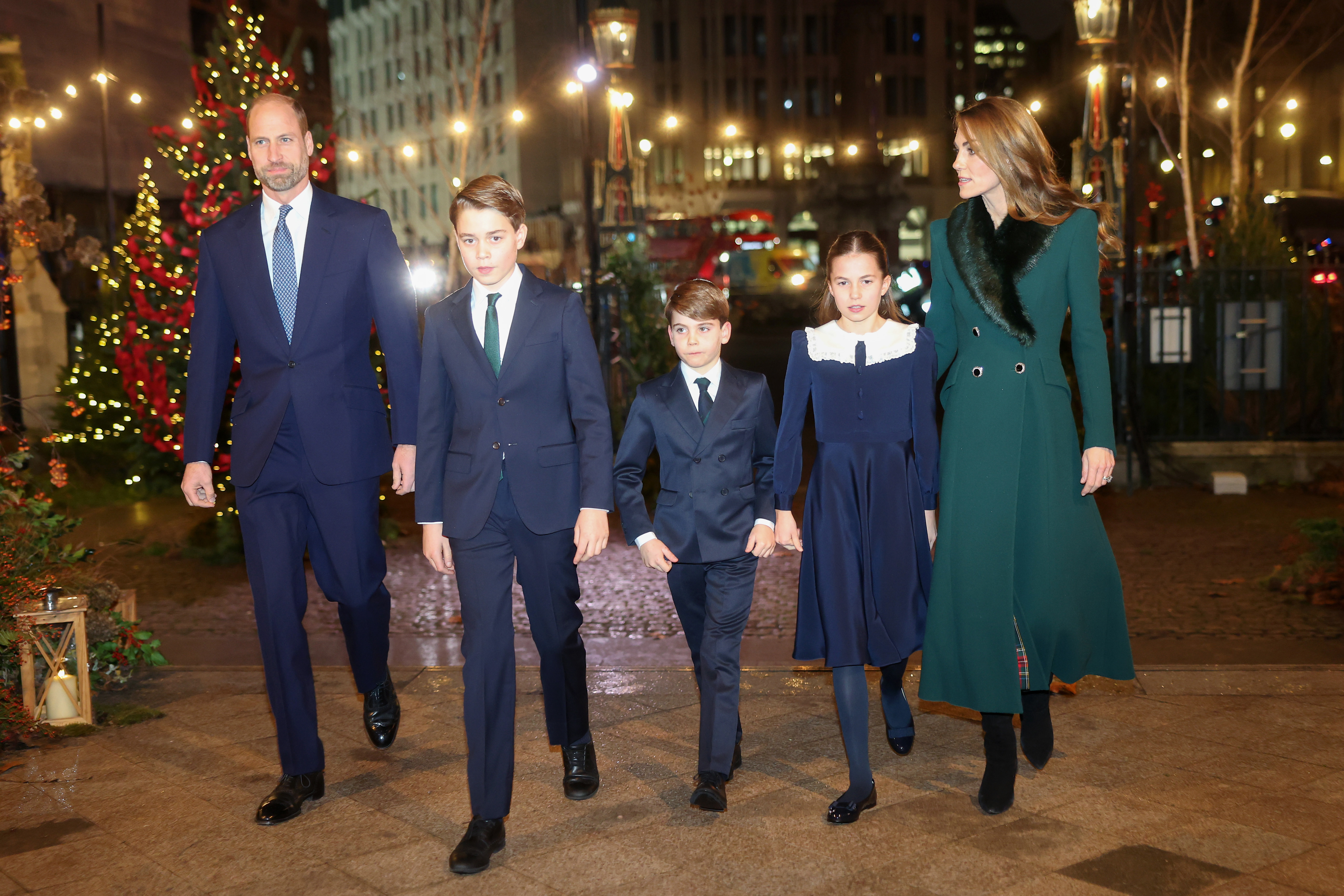 Princess Charlotte, Prince George, Prince Louis, Princess Kate, Prince William walking into the 2025 Together at Christmas concert