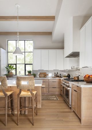 White and wooden kitchen with island
