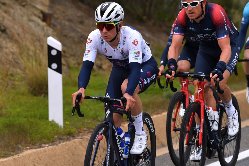 FARO PORTUGAL FEBRUARY 18 Remco Evenepoel of Belgium and Team QuickStep Alpha Vinyl white best young jersey competes during the 48th Volta Ao Algarve 2022 Stage 3 a 2114km stage from Almodvar to Faro VAlgarve2022 on February 18 2022 in Faro Portugal Photo by Luc ClaessenGetty Images