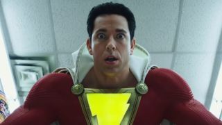 Shazam looking stunned after bullets bounce off his body during a convenience store in Shazam!