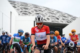 LOUVRE MUSEUM ABU DHABI UNITED ARAB EMIRATES FEBRUARY 11 Lotte Kopecky of Belgium and Team SD WorxProtime Red Leader Jersey prior to the 2nd UAE Tour 2024 Stage 4 a 105km stage from Louvre Abu Dhabi Museum to Abu Dhabi Breakwater UCIWWT on February 11 2024 in Abu Dhabi United Arab Emirates Photo by Dario BelingheriGetty Images