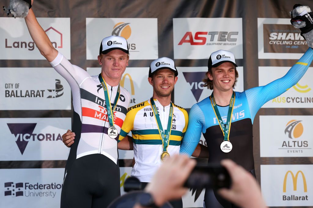 BALLARAT AUSTRALIA JANUARY 14 LR Josh Duffy of Australia on second place race winner Graeme Frislie of Australia and Zachary Marshall of Australia on third place pose on the podium ceremony after the Australian Cycling National Championships 2022 Criterium Mens U23 a 33km race from Ballarat to Ballarat AusCyclingAus on January 14 2022 in Ballarat Australia Photo by Con ChronisGetty Images