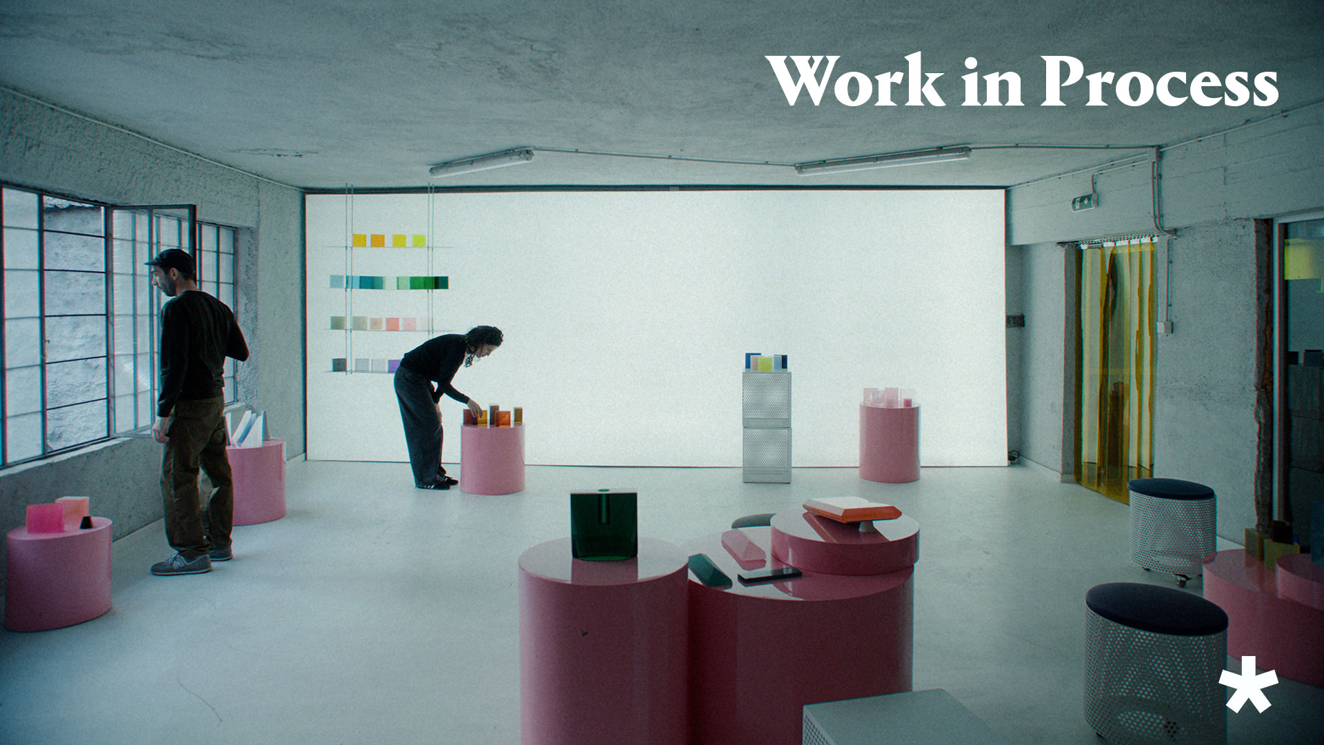 Still from Wallpaper&rsquo;s Work in Process video showing designers Objects of Common Interest with some of their colourful works in resin