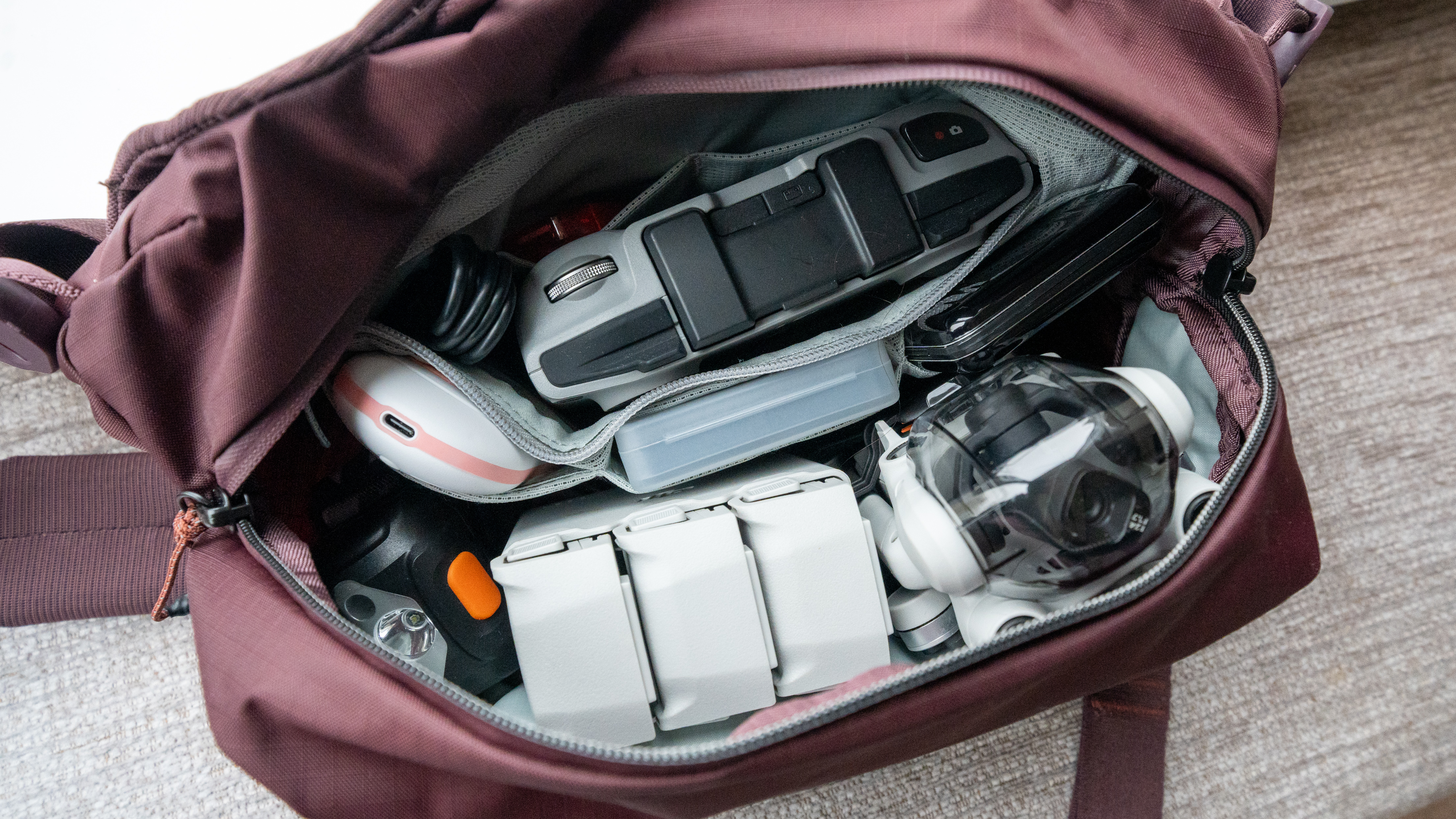 drone equipment inside the peak design sling bag