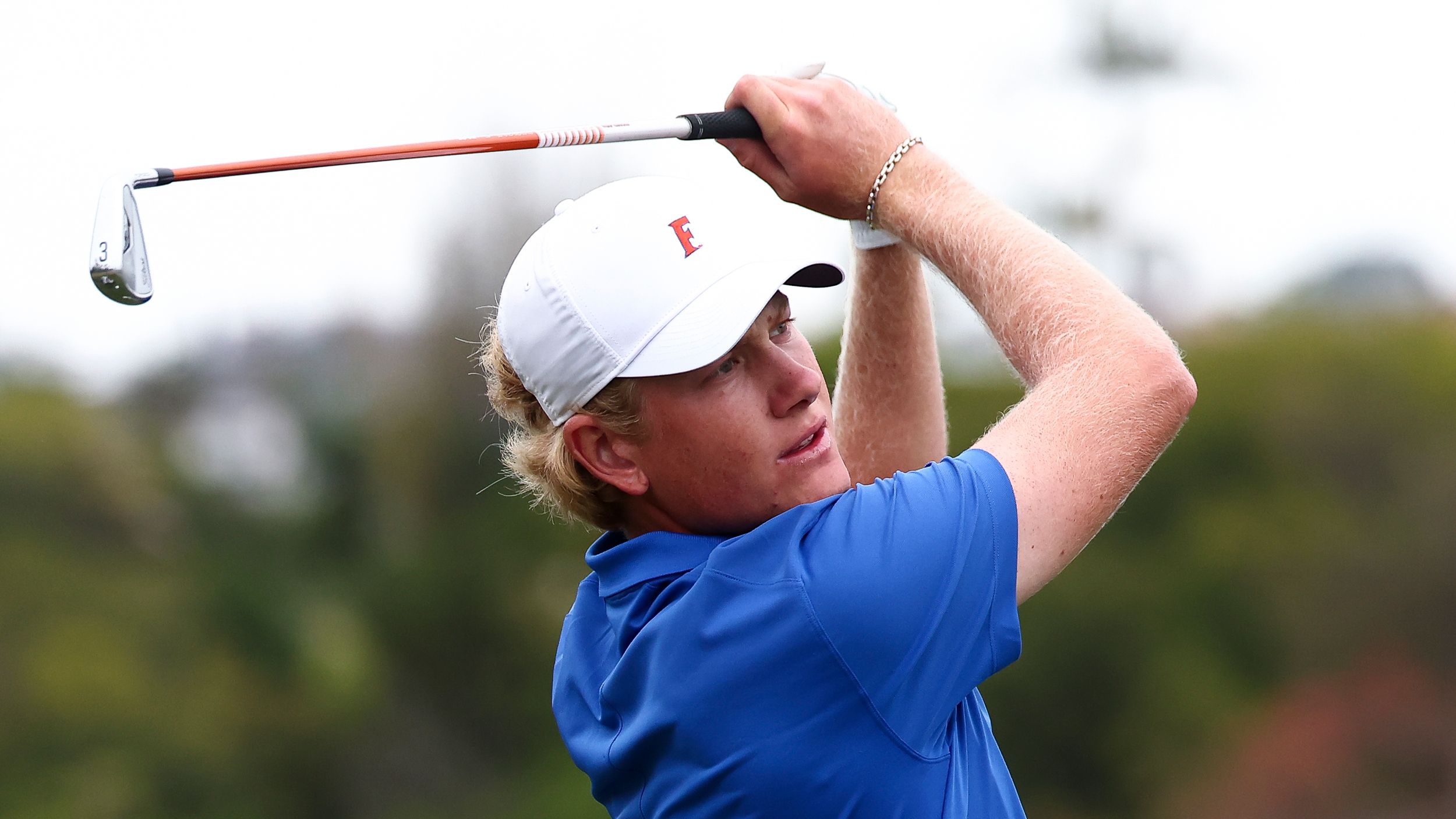 Florida State&#039;s Luke Poulter hits a 3-iron during the 2025 NCAA D1 Men&#039;s Golf Championship at Omni La Costa Resort &amp; Spa