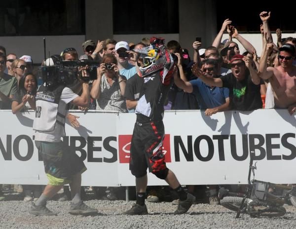 Aaron Gwin (Trek World Racing) strips off his goggles after taking the win on the final run of the day.