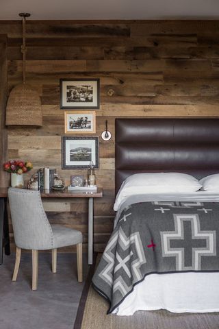 hotel room with wooden wall