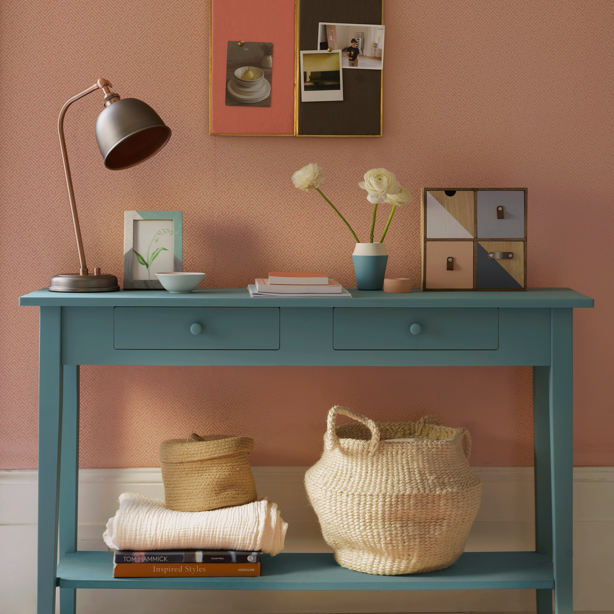 Pink hallway with blue console table