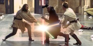 Qui-Gon Jinn and Obi-Wan Kenobi in a lightsaber duel with Darth Maul